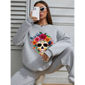 Gray crew neck sweatshirt featuring a vibrant colorful floral skull design for daily casual wear