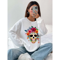 White long-sleeved crew neck sweatshirt with a vibrant colorful floral skull design for daily wear