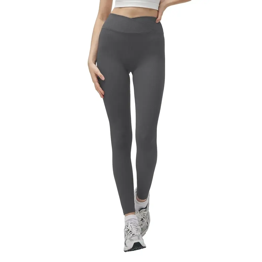 High-waisted dark gray suhk asana cross waist ribbed yoga leggings with smooth stretchy fabric and ribbed waistband