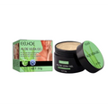 Black jar with green lid containing suntanning beauty cream with natural ingredients for even skin tone