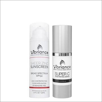 Super C vitamin serum in a silver-topped glass dropper bottle and sheer zinc sunscreen spf50 in a white pump bottle set