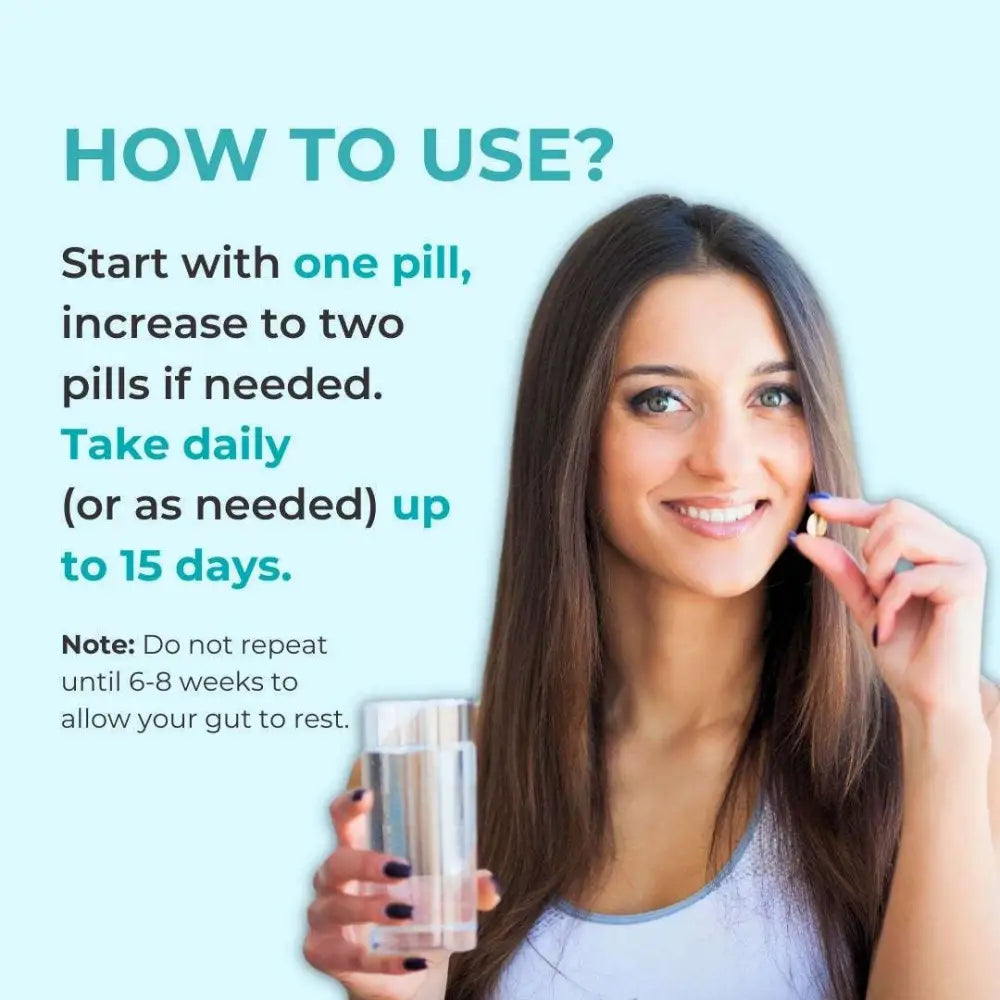 A woman holds a clear glass of water and a light brown pill from the super colon cleanse capsule for digestive health