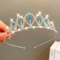 A silver sweet fashion jewelry crown headband with clear crystals and five vibrant blue gemstones