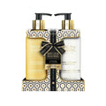 Gold and white pump bottles of baylis & harding sweet mandarin and grapefruit harding gift set with geometric box and black ribbon