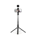 T11 rechargeable black selfie stick with built-in double lamp ring light and tripod base holding smartphone for video calls