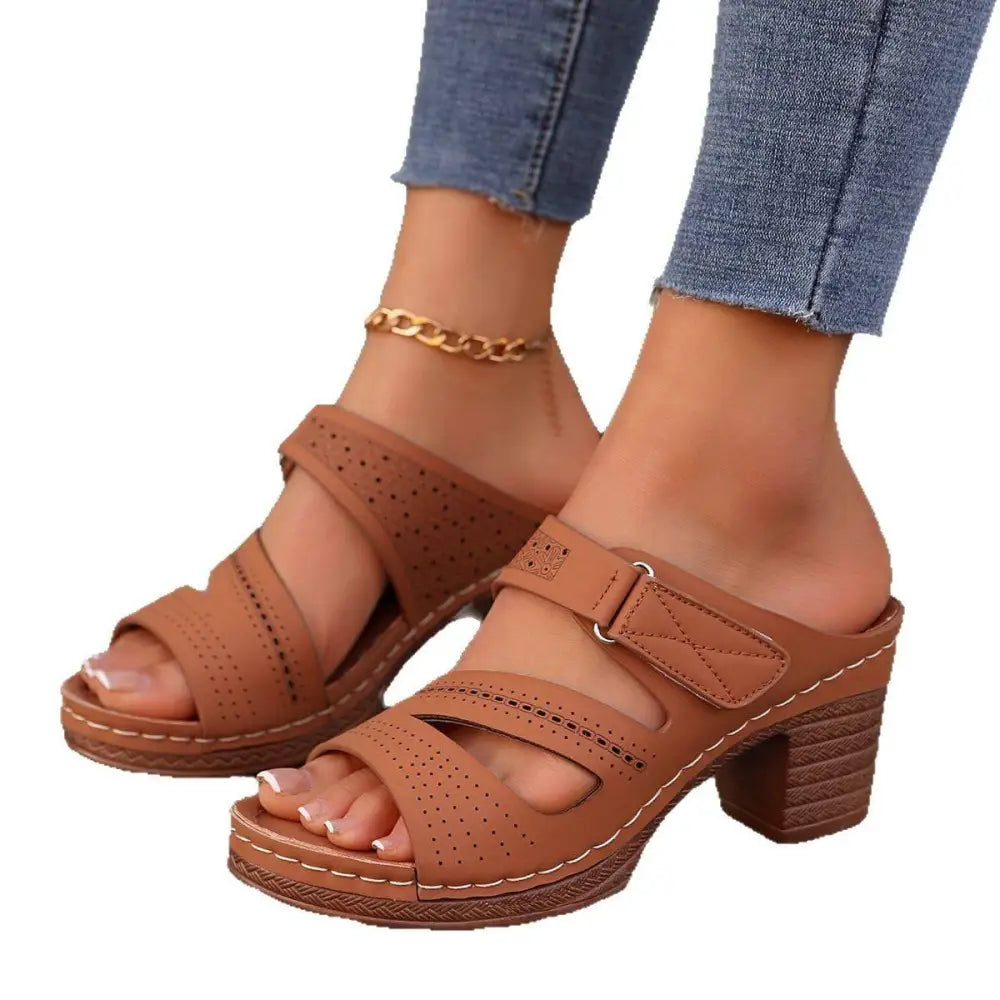 Tan leather summer casual chunky heel sandals with perforated straps and a brown leather chunky heel design