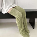 Soft moss green plush over-the-knee fuzzy long socks with cozy textured fabric perfect for casual wear