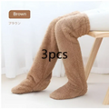Tan paw print fuzzy long socks in brown plush material featuring a soft fuzzy texture and cozy leg warmer design
