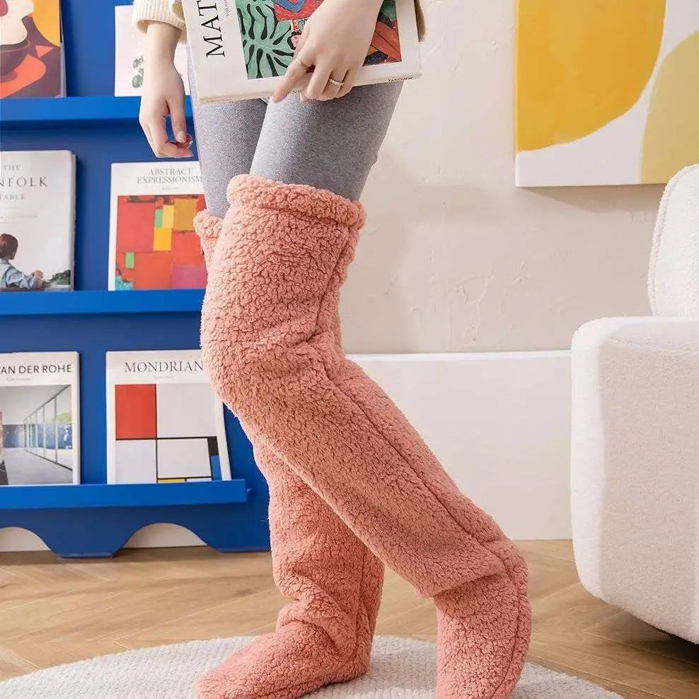 Pink fuzzy long socks with plush textured material and ribbed cuffs in tan paw print design