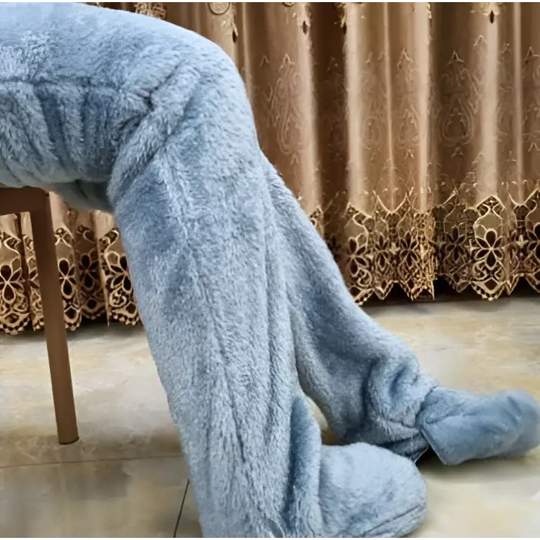 Light blue plush fleece fuzzy long socks with soft textured surface and elastic cuffs for cozy wear