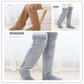 Tan paw print fuzzy long socks featuring brown and gray plush fluffy over-the-knee leg warmers