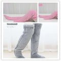 Soft plush fuzzy long socks in pink and gray with tan paw print design for cozy over-the-knee wear