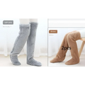 Tan paw print fuzzy long socks in light gray and brown with plush soft texture for cozy warmth over the knee