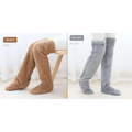 Tan paw print fuzzy long socks in brown and light gray plush material with a fluffy over-the-knee design