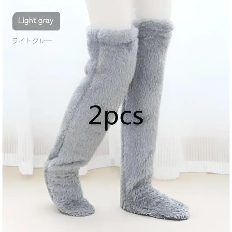 Light gray fuzzy long socks with tan paw print design soft plush knee-high for cozy wear