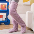 Soft lavender fuzzy long socks with tan paw print and gray plush texture featuring a snug over-the-knee fit