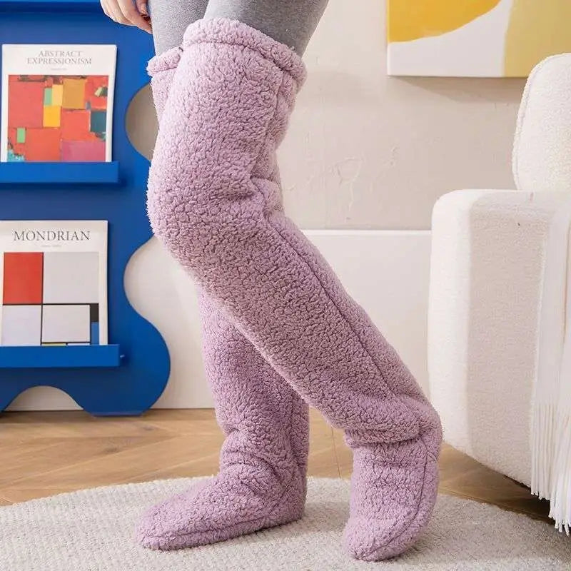 Soft lavender fuzzy long socks with tan paw print and gray plush texture featuring a snug over-the-knee fit