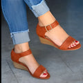 Tan suede wedge buckle strap sandals with gold-tone buckle and wooden sole for plus size fashion wedge buckle footwear