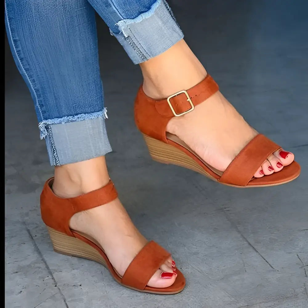 Tan suede wedge buckle strap sandals with gold-tone buckle and wooden sole for plus size fashion wedge buckle footwear