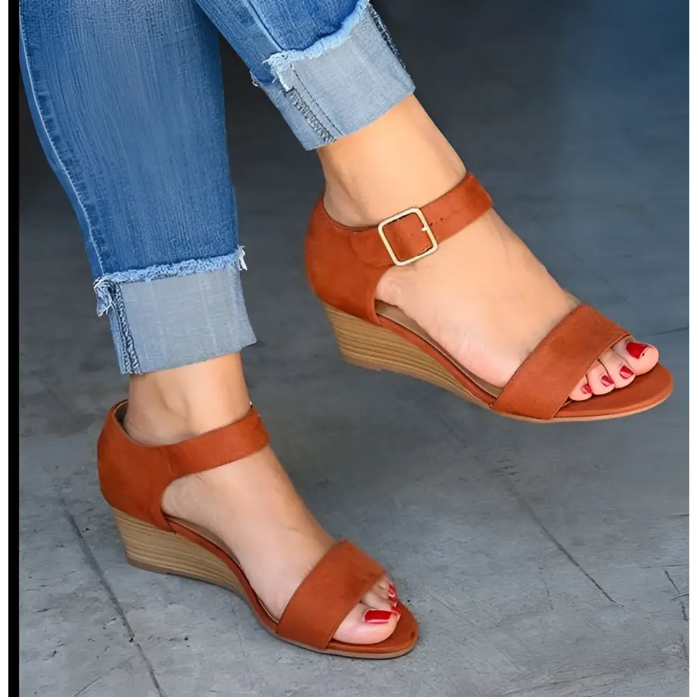 Tan suede wedge buckle strap plus size sandals with a gold-toned buckle and wooden textured heel fashion wedge buckle