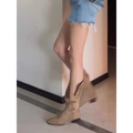 Tan suede western cowboy pile style boots with pointed toe and low block heel in soft suede material
