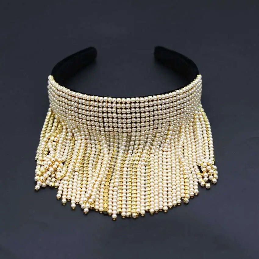 A glamorous tassel diamond pearl bridal headband set featuring a pearl and gold fringe choker with black velvet interior