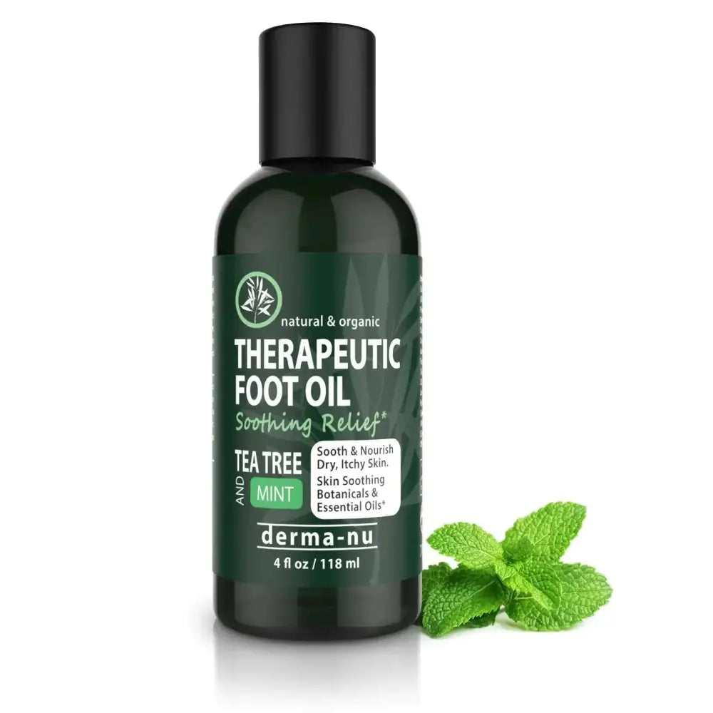 Dark green glass bottle of derma-nu tea tree oil therapeutic foot and body oil with black cap and mint leaf for cracked heel repair and toe odor