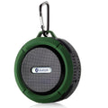 Teal and black portable waterproof speaker with carabiner clip ideal for outdoor use and fits with luxury women’s fashion styles