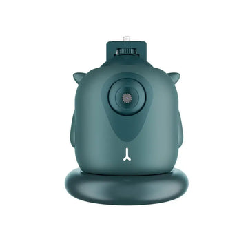 Teal owl-shaped camera with matte finish and small ears featuring gimbal ai face intelligent follow-up tracking