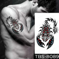 Black and red tribal scorpion temporary body tattoo with white details on dark blue background from teal phoenix floral waterproof temporary collection