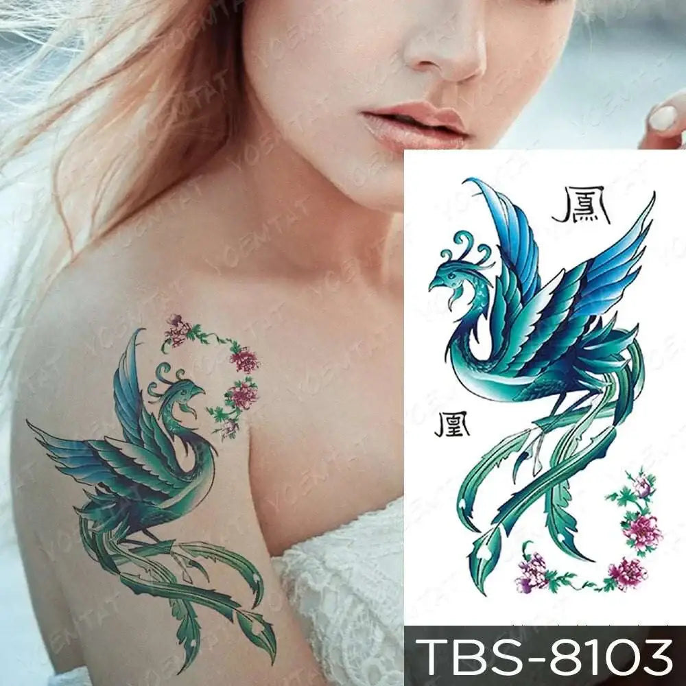 A vibrant teal phoenix and floral waterproof temporary tattoo with delicate pink accents for temporary body art application