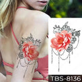 A delicate pink peony floral waterproof temporary tattoo with intricate black lace and bead chains from teal phoenix