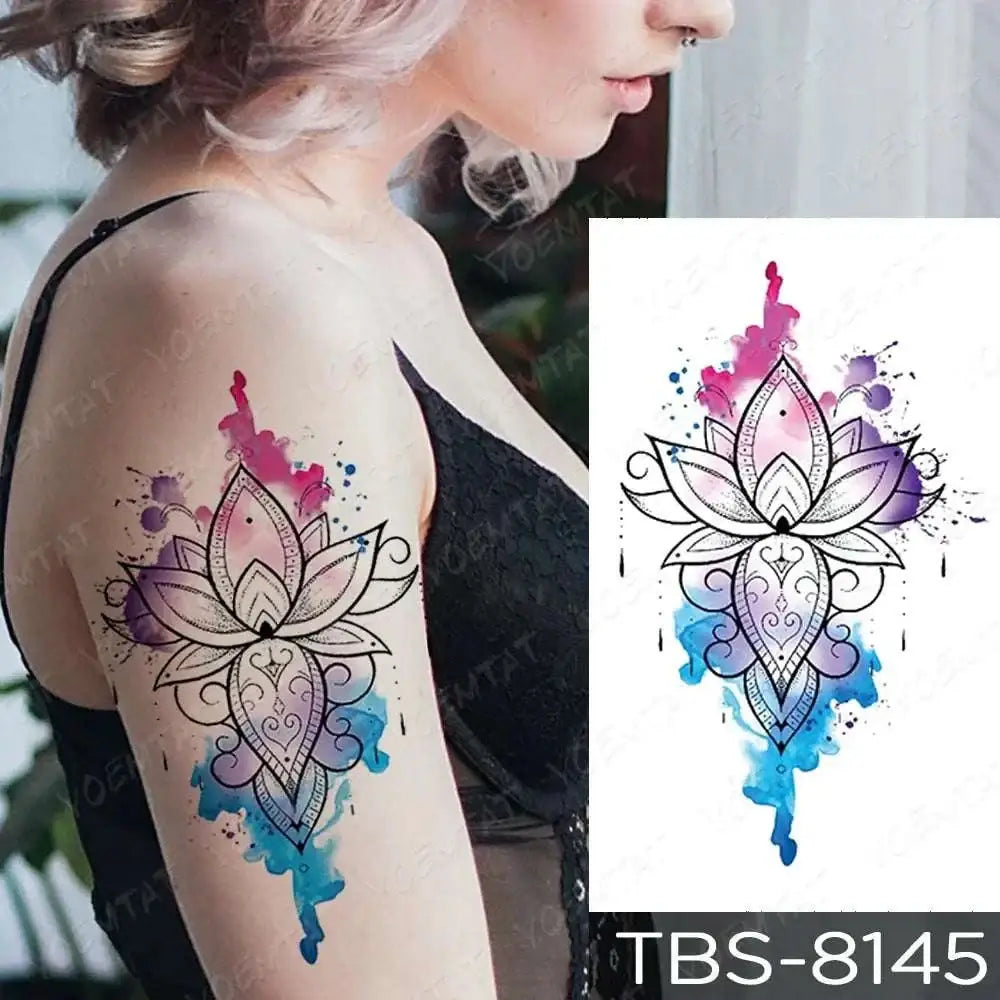 Teal phoenix floral waterproof temporary tattoo featuring a watercolor lotus with black line art and colorful splashes