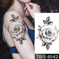 Black and white rose floral waterproof temporary tattoo with detailed shading on leaf design in teal phoenix style temporary body art