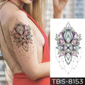 Teal phoenix and floral waterproof temporary tattoo featuring a delicate floral design with pink petals and green leaves