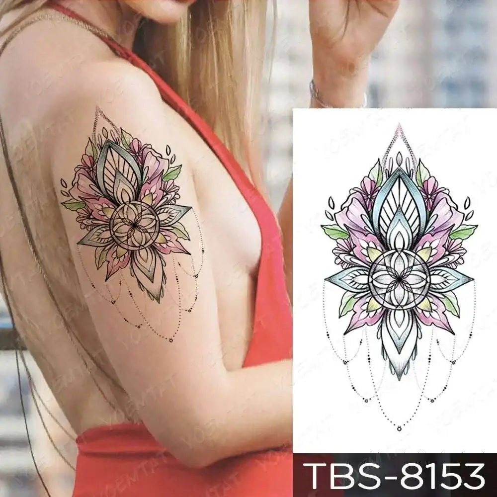 Teal phoenix and floral waterproof temporary tattoo featuring a delicate floral design with pink petals and green leaves