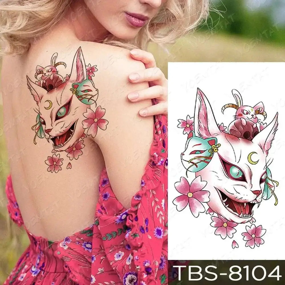 Teal phoenix and floral waterproof temporary tattoo featuring a pink and white fox-faced design with floral details and a crescent moon