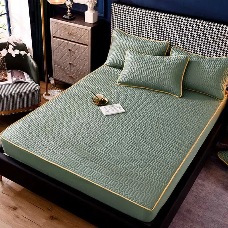 Teal quilted thickened all-inclusive dust-proof single-piece fitted bed pad in soft mint green with geometric pattern and gold trim