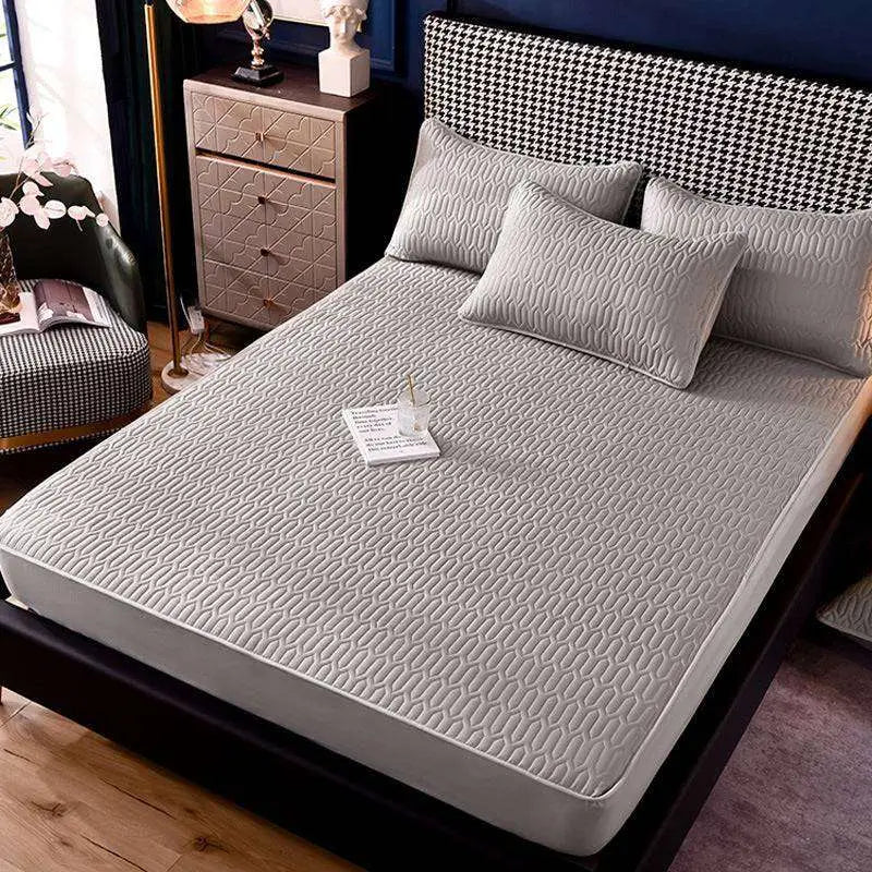 Gray quilted bed pad with subtle geometric pattern for thickened all-inclusive dust-proof single-piece fitted use