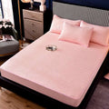 Pink quilted thickened all-inclusive dust-proof single-piece fitted bed sheet with a subtle geometric pattern