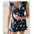 Teal ruffled deep v one-piece swimsuit with built-in bra featuring navy blue floral print and ruffled sleeves and hem