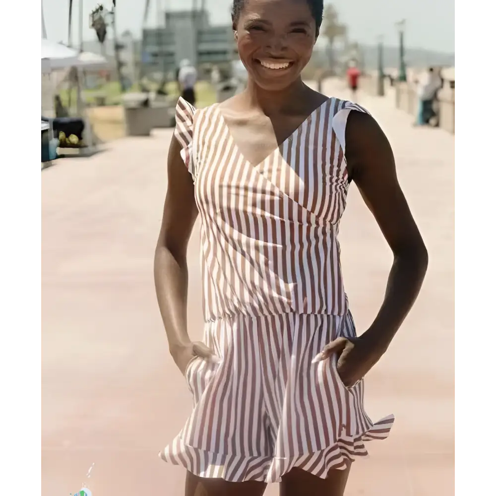 A woman wears a beige and white sleeveless romper with ruffled straps and hem, contrasting with the teal ruffled deep v one-piece swimsuit with built-in bra suitable for hot spring boxer use