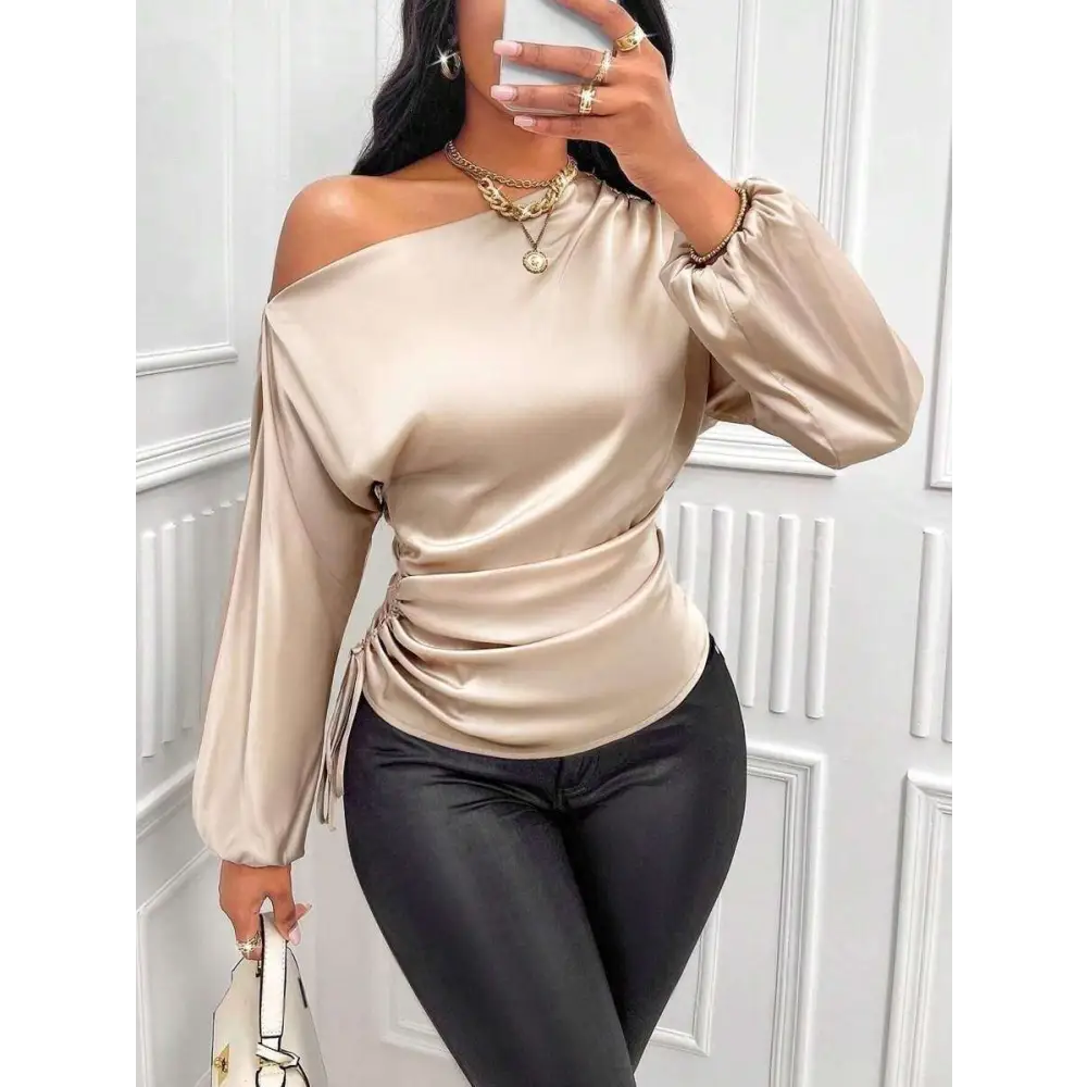 Beige satin off the shoulder top with long sleeves and ruched waist styled with teal satin shirt asymmetric design