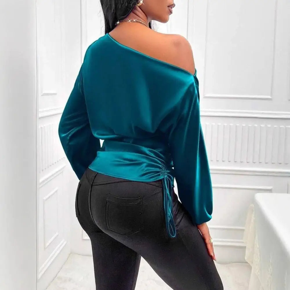 Teal satin shirt asymmetric long sleeve top featuring a ruched waist and off-the-shoulder velvet design