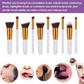Set of eight makeup brushes with white handles gold ferrules and black bristles from a ten piece makeup brush set with maroon case