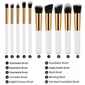 Ten piece makeup brush set with white handles gold ferrules black bristles and maroon case beauty complete kit
