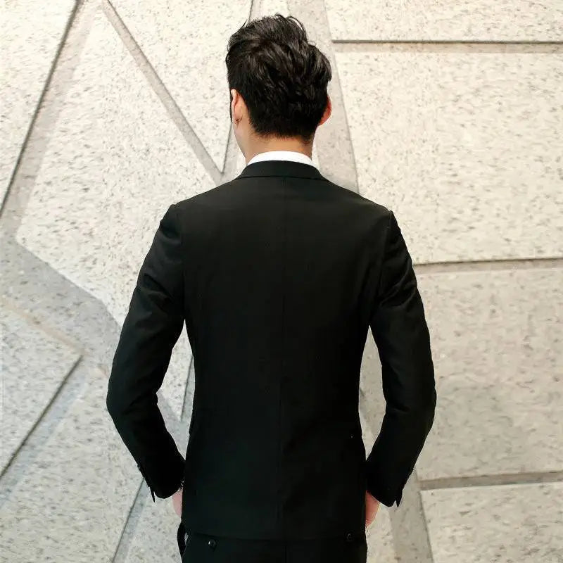 Black men’s suit three-piece with tailored fit and subtle texture for a refined formal appearance
