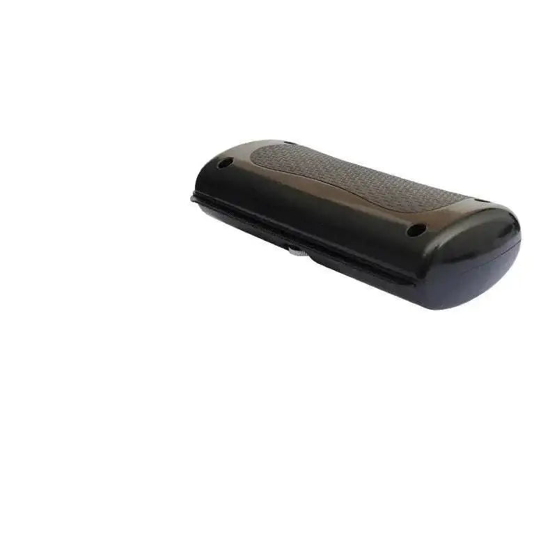 Black plastic eyeglass case with textured grip surface complementing textured grip pet grooming comb design