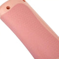 Pink silicone phone case with textured honeycomb grip pattern designed for grip pet grooming comb users