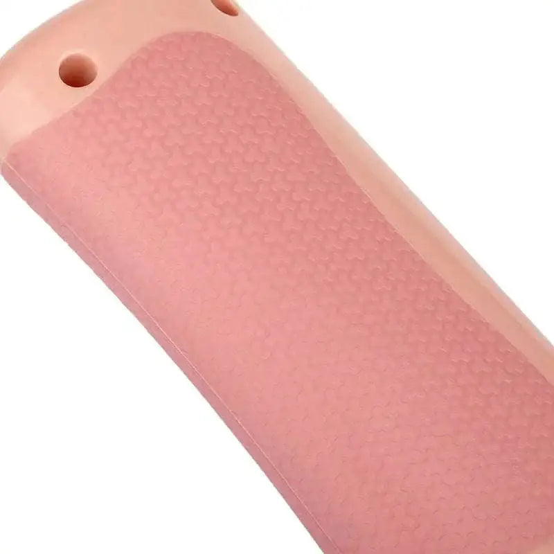 Pink silicone phone case with textured honeycomb grip pattern designed for grip pet grooming comb users